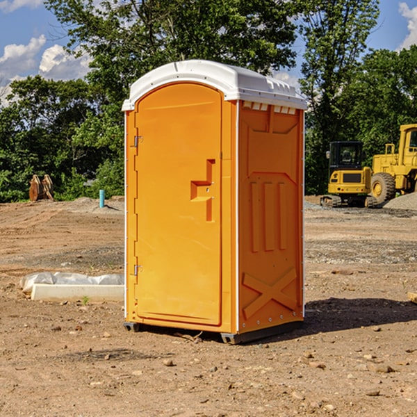 what is the cost difference between standard and deluxe portable restroom rentals in Byron Center